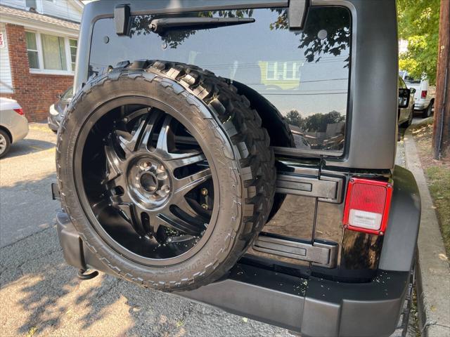 used 2011 Jeep Wrangler Unlimited car, priced at $9,999