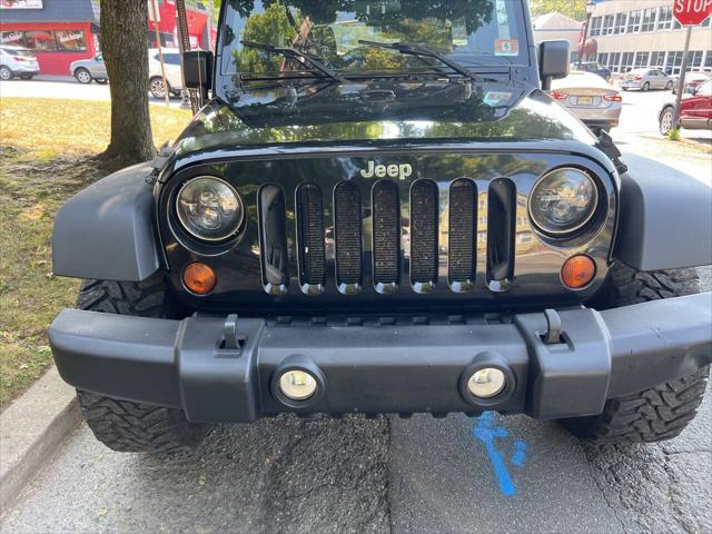 used 2011 Jeep Wrangler Unlimited car, priced at $8,999