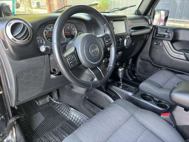 used 2011 Jeep Wrangler Unlimited car, priced at $8,999