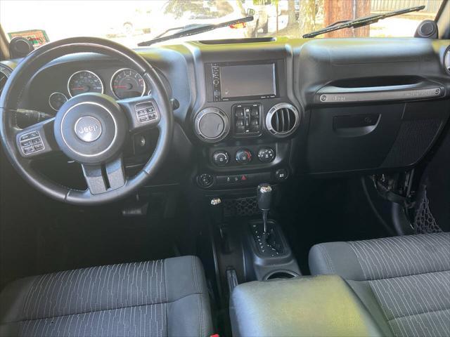 used 2011 Jeep Wrangler Unlimited car, priced at $9,999