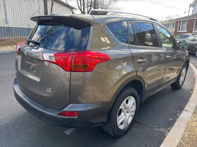 used 2013 Toyota RAV4 car, priced at $9,999