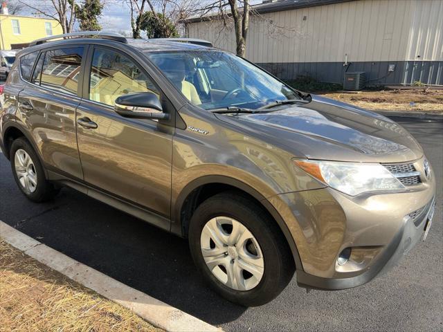 used 2013 Toyota RAV4 car, priced at $9,999