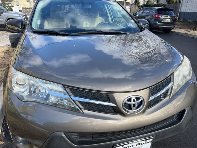 used 2013 Toyota RAV4 car, priced at $9,999