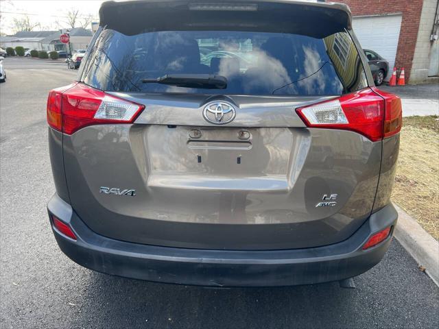 used 2013 Toyota RAV4 car, priced at $9,999