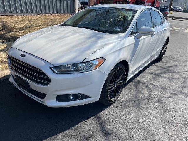 used 2014 Ford Fusion car, priced at $5,999