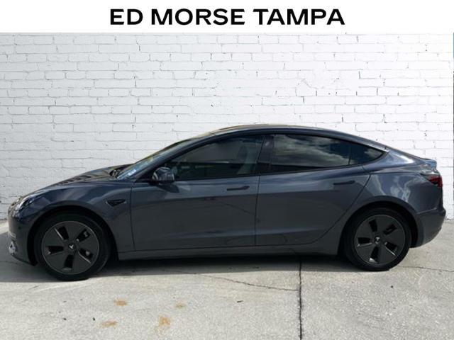 used 2023 Tesla Model 3 car, priced at $28,122