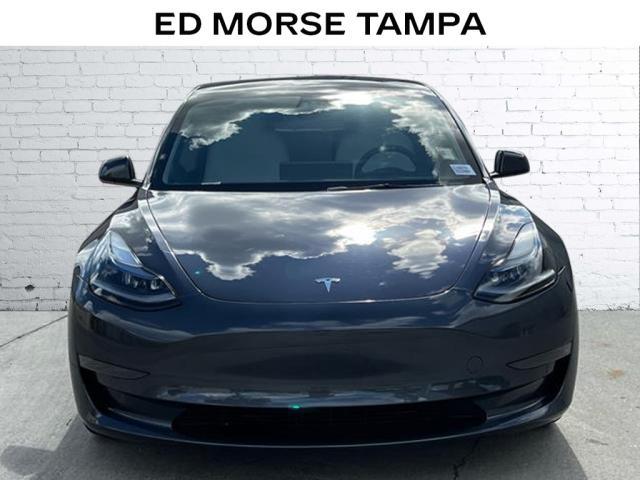 used 2023 Tesla Model 3 car, priced at $28,122