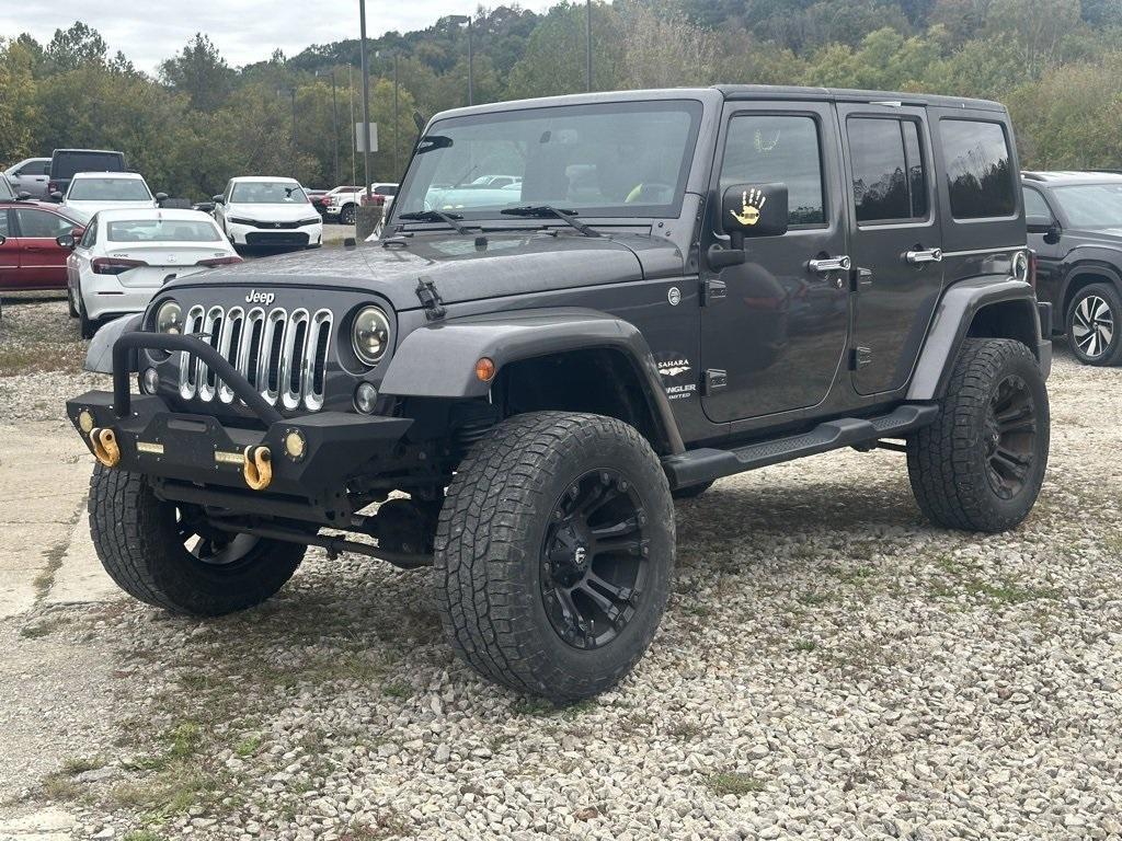 used 2014 Jeep Wrangler Unlimited car, priced at $17,886