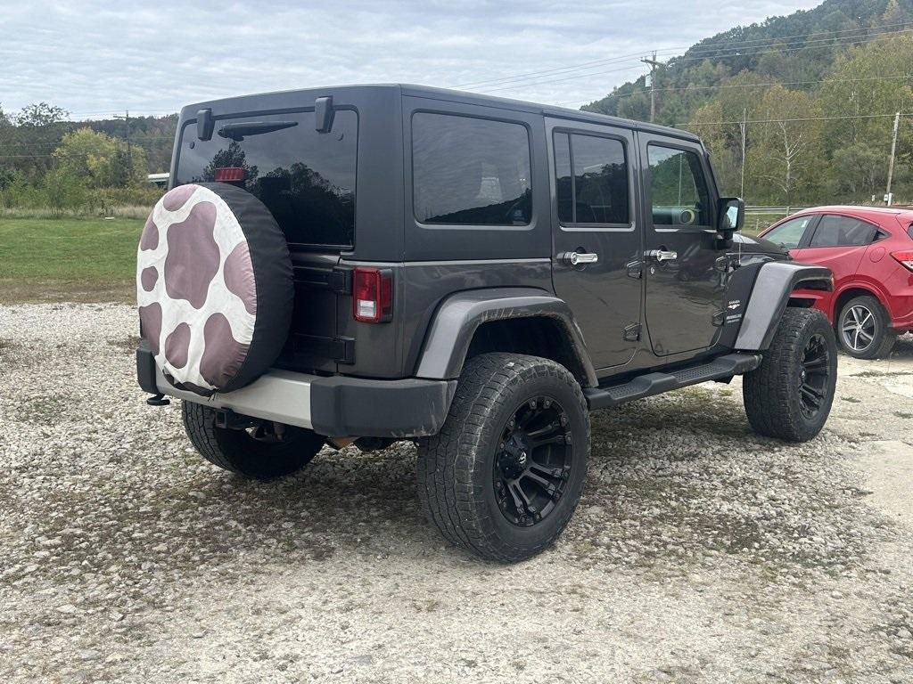 used 2014 Jeep Wrangler Unlimited car, priced at $16,980