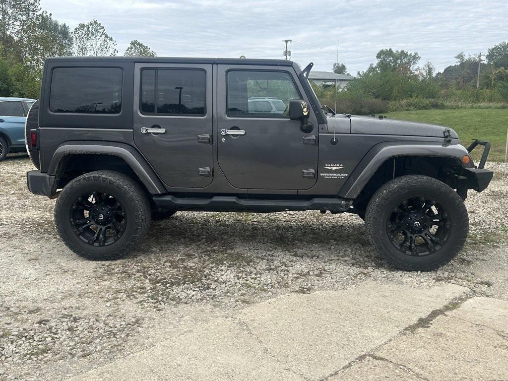 used 2014 Jeep Wrangler Unlimited car, priced at $16,980