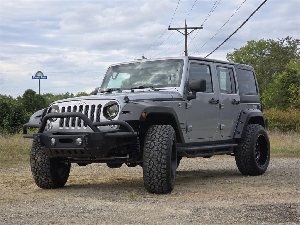 used 2015 Jeep Wrangler Unlimited car, priced at $14,466