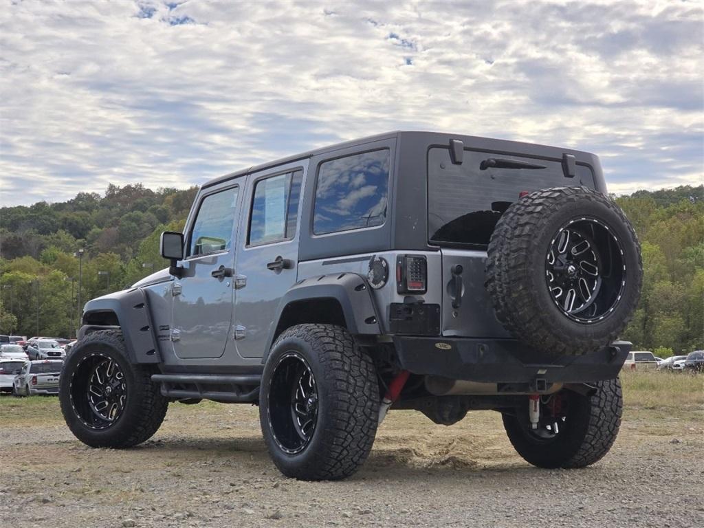 used 2015 Jeep Wrangler Unlimited car, priced at $14,466