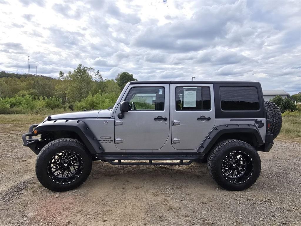 used 2015 Jeep Wrangler Unlimited car, priced at $14,466