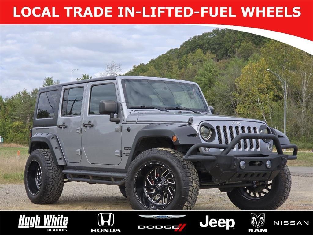 used 2015 Jeep Wrangler Unlimited car, priced at $14,466