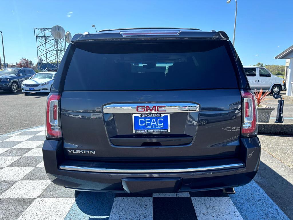 used 2015 GMC Yukon car, priced at $25,155