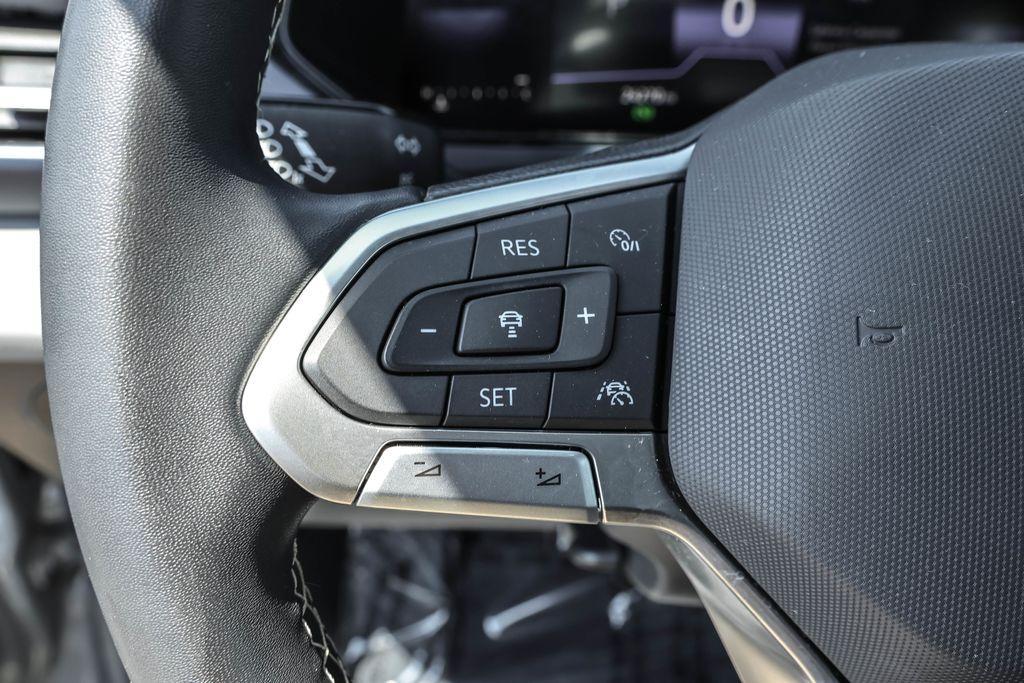 used 2023 Volkswagen Taos car, priced at $24,640