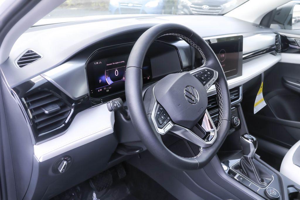 new 2025 Volkswagen Taos car, priced at $27,305