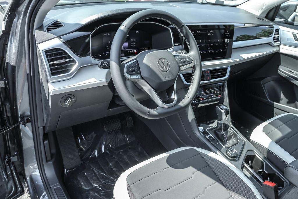 new 2025 Volkswagen Taos car, priced at $30,128