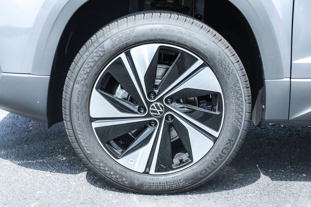 new 2025 Volkswagen Taos car, priced at $30,128