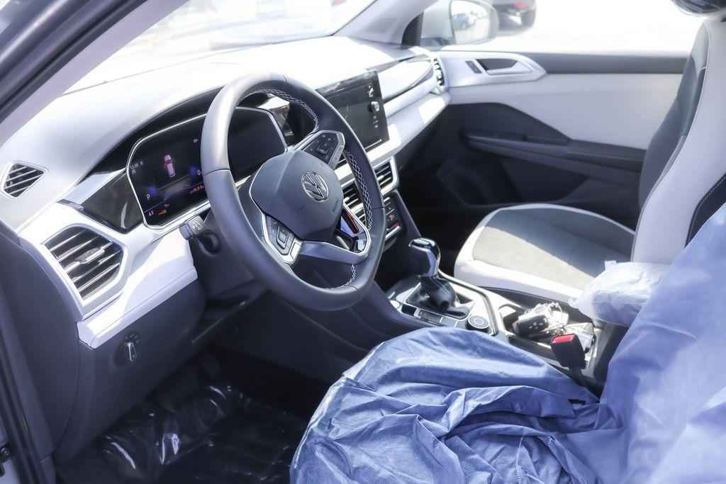 new 2025 Volkswagen Taos car, priced at $28,638
