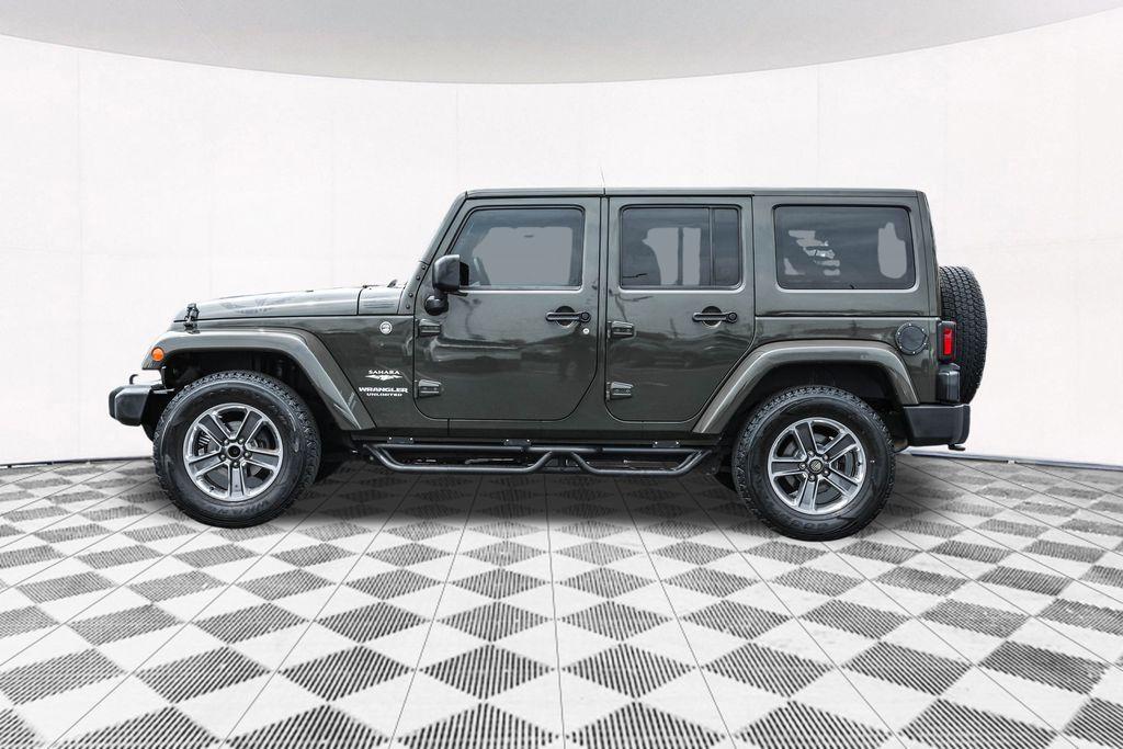 used 2015 Jeep Wrangler Unlimited car, priced at $19,528