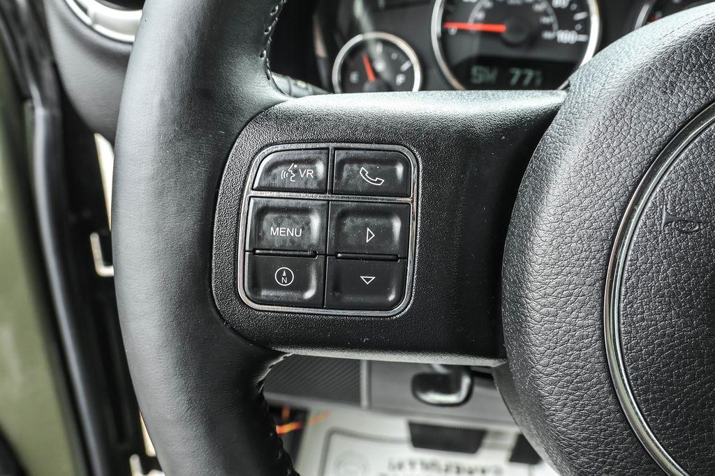 used 2015 Jeep Wrangler Unlimited car, priced at $19,528