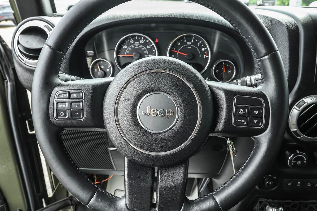 used 2015 Jeep Wrangler Unlimited car, priced at $19,528