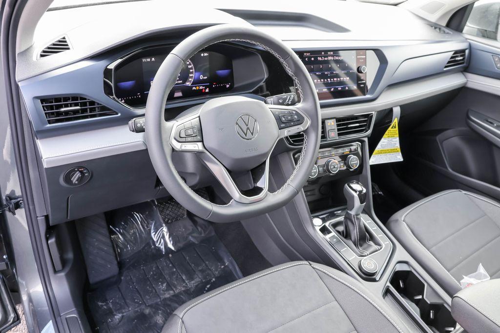 new 2024 Volkswagen Taos car, priced at $29,311