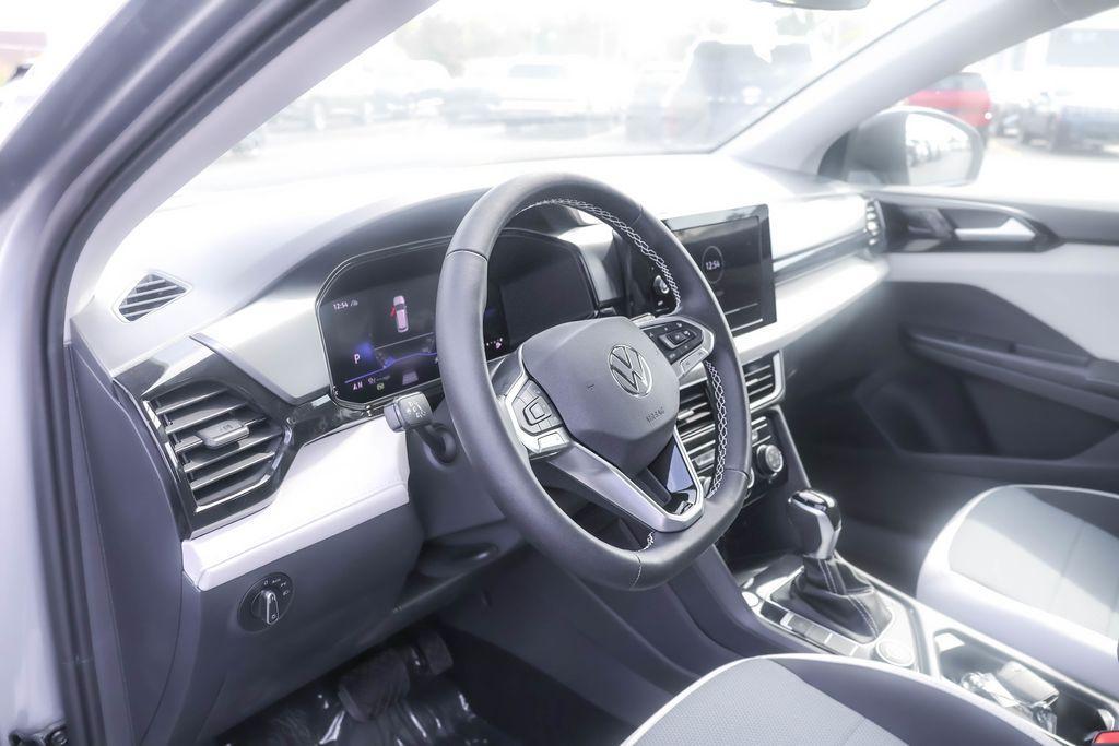 new 2025 Volkswagen Taos car, priced at $26,056