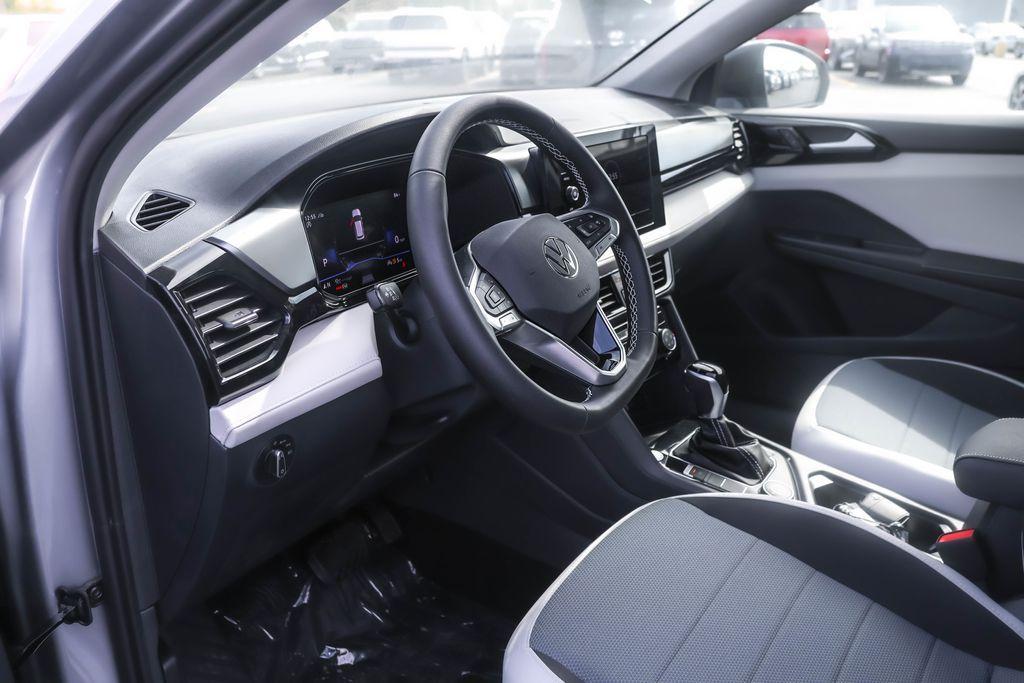 new 2025 Volkswagen Taos car, priced at $26,056