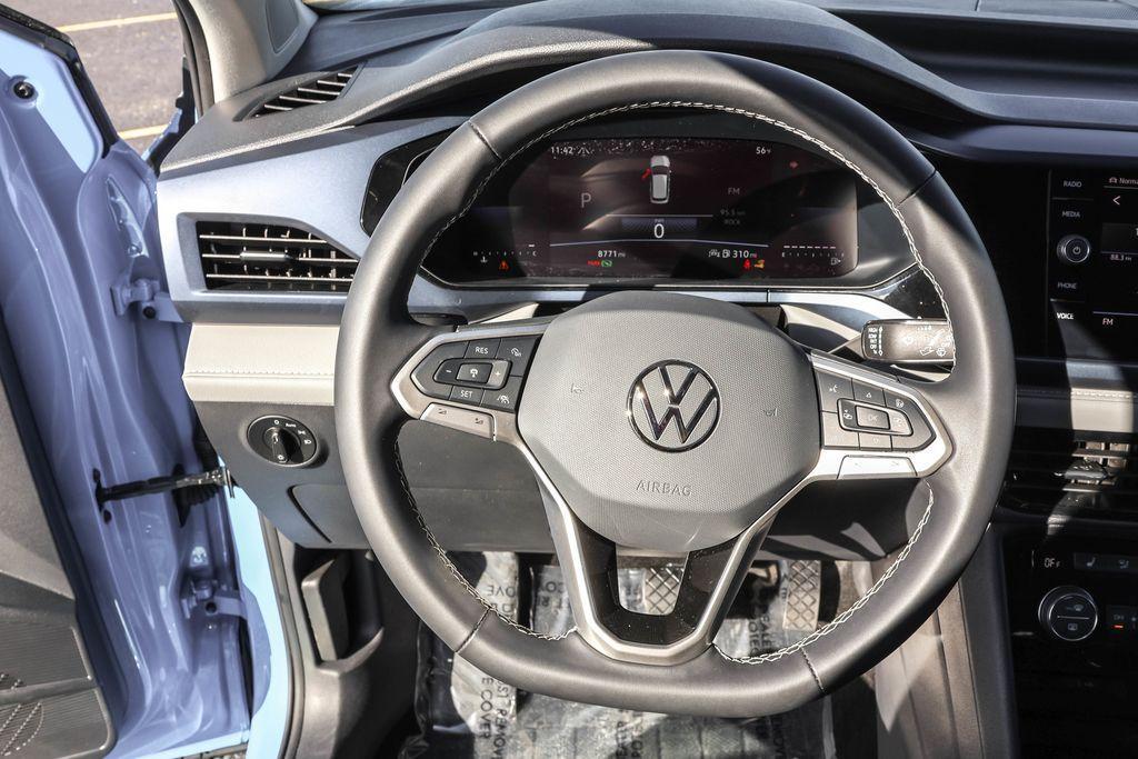 used 2024 Volkswagen Taos car, priced at $25,384
