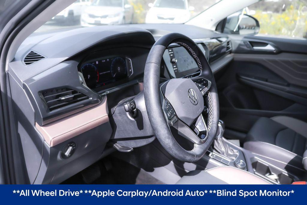 used 2024 Volkswagen Taos car, priced at $26,655