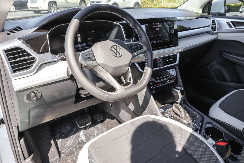 new 2025 Volkswagen Taos car, priced at $30,138