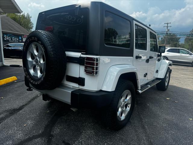 used 2014 Jeep Wrangler Unlimited car, priced at $15,877