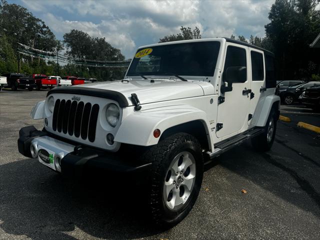 used 2014 Jeep Wrangler Unlimited car, priced at $15,877