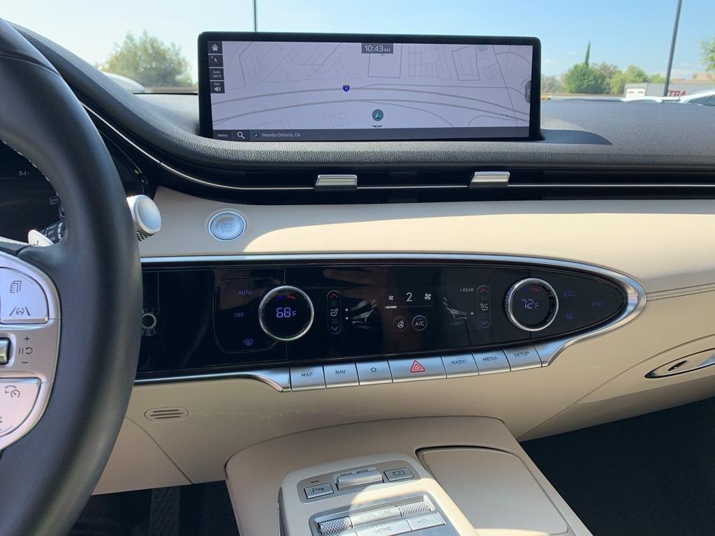 used 2023 Genesis GV70 car, priced at $37,131