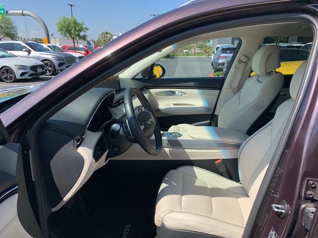 used 2023 Genesis GV70 car, priced at $37,131