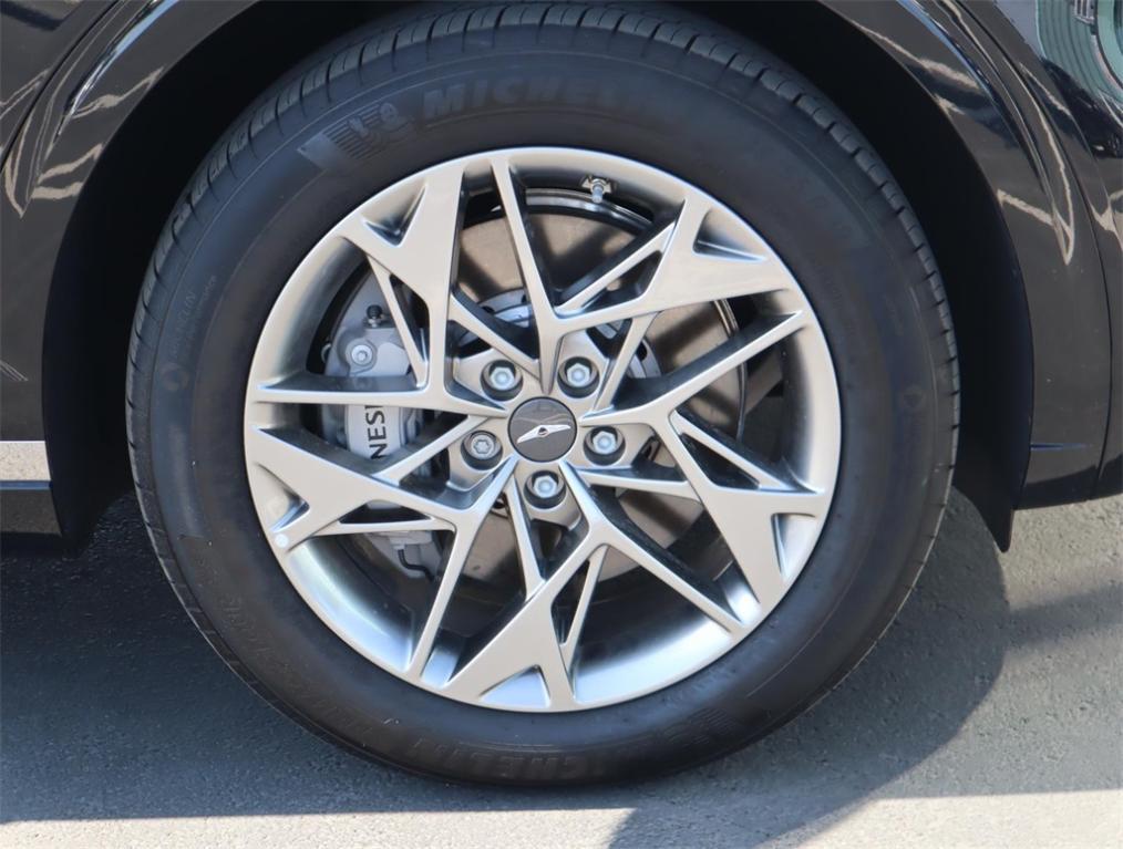 new 2024 Genesis GV70 car, priced at $53,555