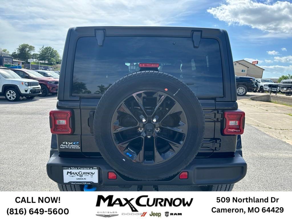 used 2023 Jeep Wrangler 4xe car, priced at $49,898
