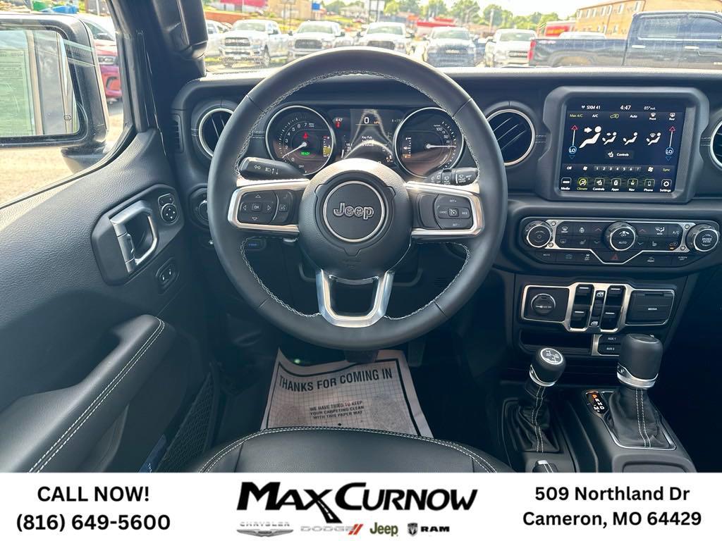 used 2023 Jeep Wrangler 4xe car, priced at $49,898