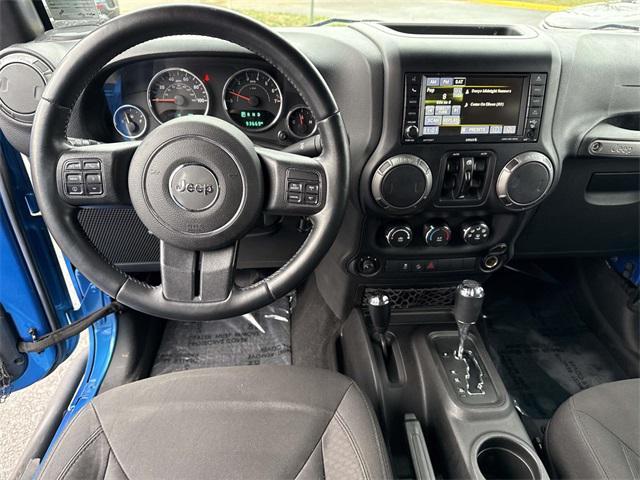used 2015 Jeep Wrangler Unlimited car, priced at $16,975