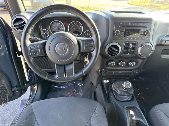 used 2016 Jeep Wrangler Unlimited car, priced at $17,475