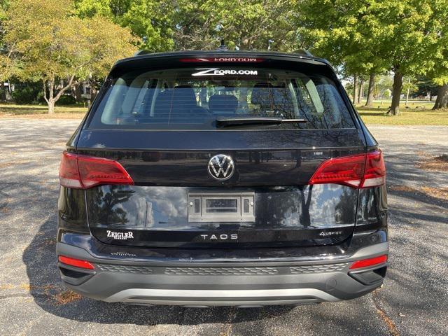 used 2024 Volkswagen Taos car, priced at $21,349