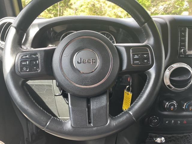 used 2015 Jeep Wrangler Unlimited car, priced at $14,000