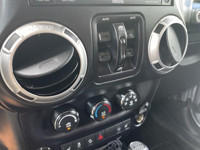 used 2015 Jeep Wrangler Unlimited car, priced at $14,000
