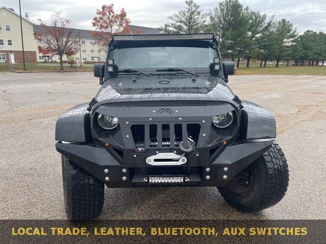 used 2014 Jeep Wrangler Unlimited car, priced at $23,485