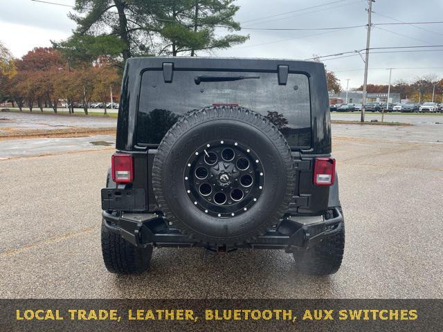 used 2014 Jeep Wrangler Unlimited car, priced at $23,485