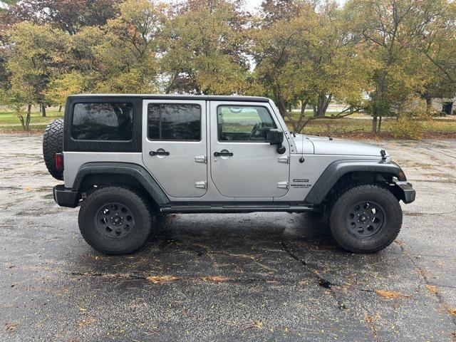 used 2013 Jeep Wrangler Unlimited car, priced at $15,000
