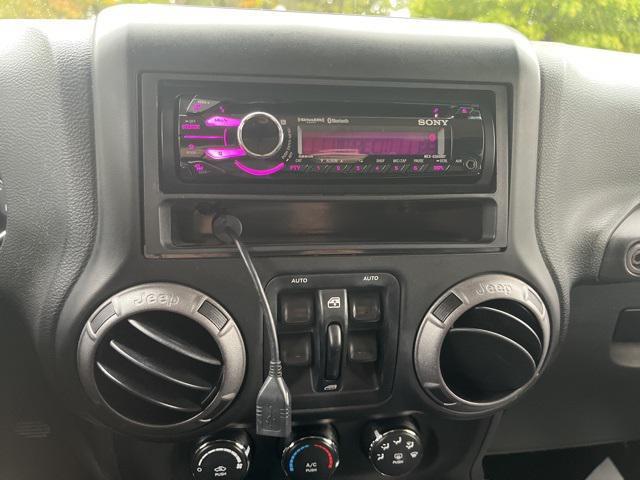 used 2013 Jeep Wrangler Unlimited car, priced at $15,000