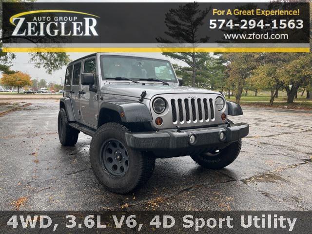 used 2013 Jeep Wrangler Unlimited car, priced at $15,000